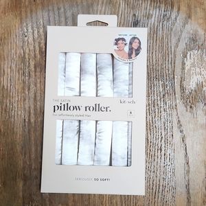 Kitsch satin pillow rollers.